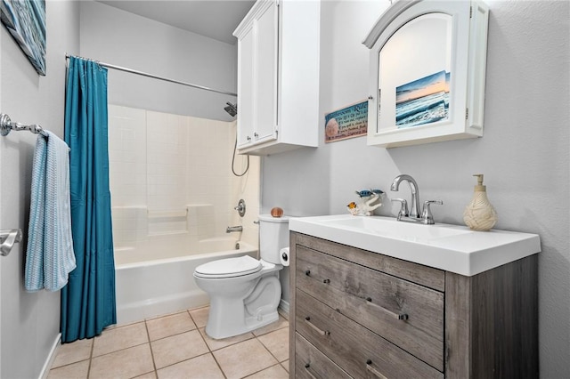 bathroom featuring baseboards, toilet, shower / tub combo with curtain, vanity, and tile patterned flooring