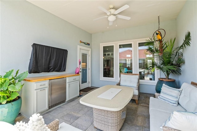 view of patio / terrace featuring ceiling fan