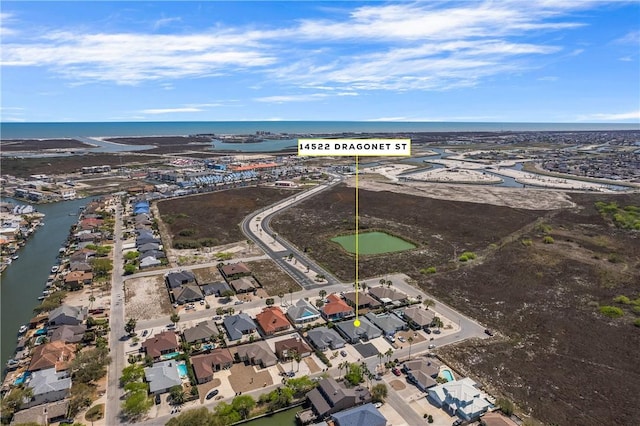 aerial view featuring a water view and a residential view
