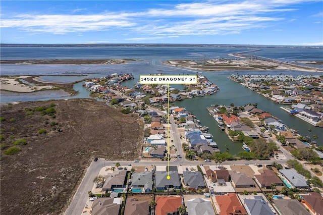 aerial view featuring a residential view and a water view