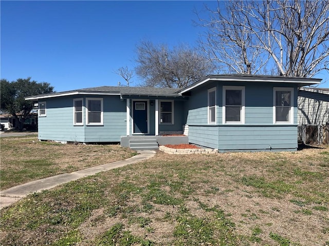 view of front of house with a front lawn