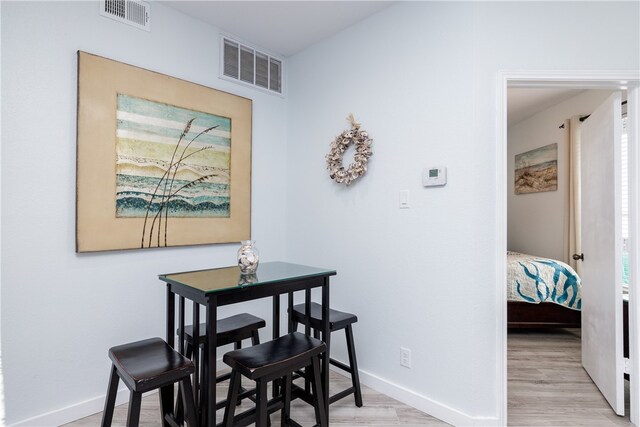 dining room featuring light hardwood / wood-style flooring