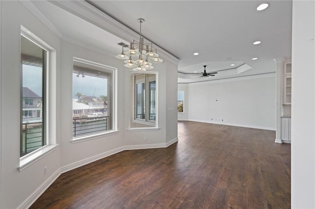 10 Kingfisher Ln, Rockport, TX 78382 - unfurnished dining area with crown molding, plenty of natural light, dark wood finished floors, a ceiling fan, and recessed lighting