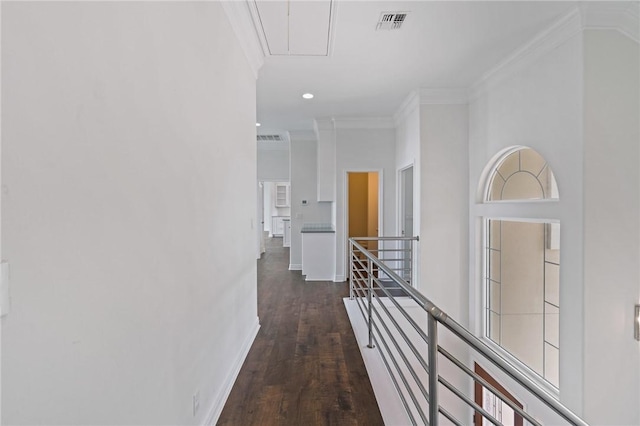 10 Kingfisher Ln, Rockport, TX 78382 - hall with an upstairs landing, attic access, dark wood-style floors, crown molding, and recessed lighting
