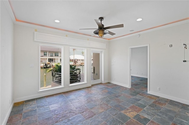 10 Kingfisher Ln, Rockport, TX 78382 - spare room featuring stone tile flooring, crown molding, a ceiling fan, and recessed lighting