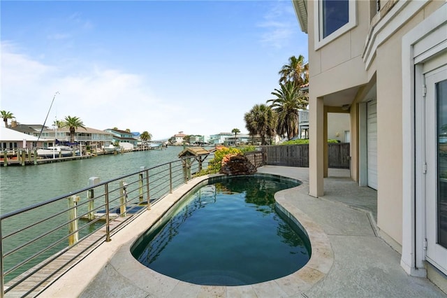 10 Kingfisher Ln, Rockport, TX 78382 - view of pool featuring a water view and a patio area
