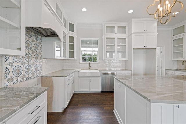 10 Kingfisher Ln, Rockport, TX 78382 - kitchen with stainless steel dishwasher, light stone countertops, tasteful backsplash, a chandelier, and recessed lighting
