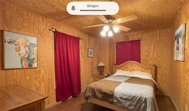 197 N Tomahawk Way, Concan, TX 78838 - bedroom featuring wooden walls and a ceiling fan