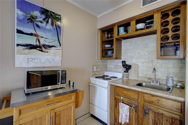 3938 Surfside Blvd Unit 3114, Corpus Christi, TX 78402 - kitchen featuring stainless steel microwave, white range with electric cooktop, a sink, crown molding, and decorative backsplash