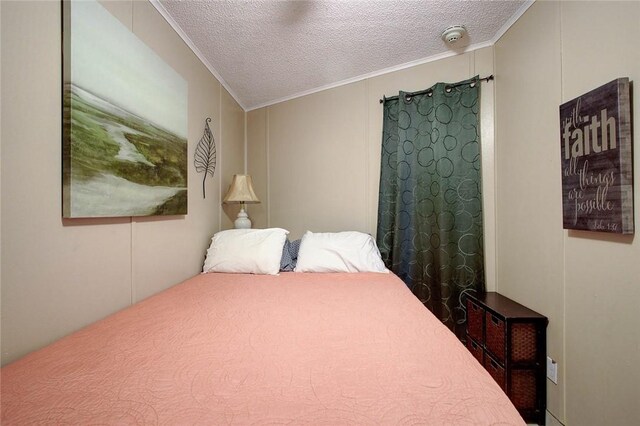 3938 Surfside Blvd Unit 3114, Corpus Christi, TX 78402 - bedroom with ornamental molding and a textured ceiling
