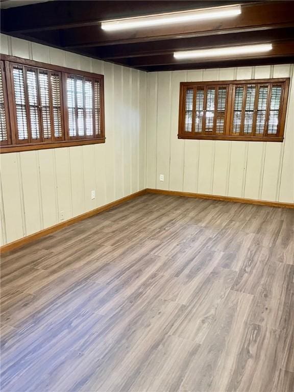 4225 Lowman St, Corpus Christi, TX 78411 - spare room with wood finished floors, baseboards, and beamed ceiling