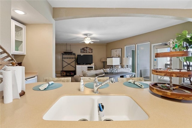 6317 State Highway 361 Unit 6203, Port Aransas, TX 78373 - kitchen with a ceiling fan and light countertops
