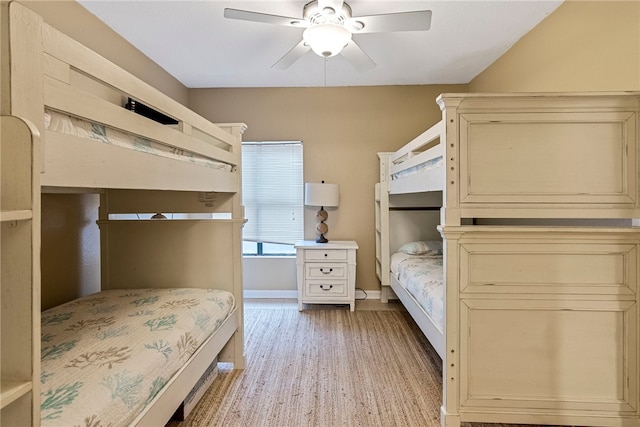 unfurnished bedroom featuring ceiling fan and light hardwood / wood-style flooring