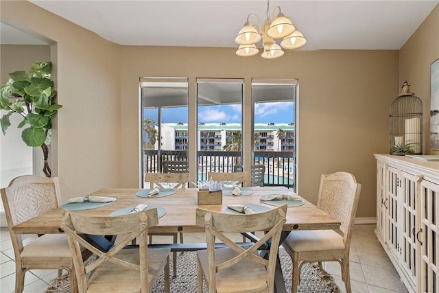 6317 State Highway 361 Unit 6203, Port Aransas, TX 78373 - dining area featuring a chandelier and light tile patterned floors