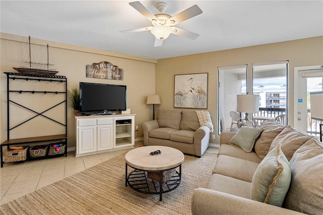 6317 State Highway 361 Unit 6203, Port Aransas, TX 78373 - living room with light tile patterned flooring and ceiling fan