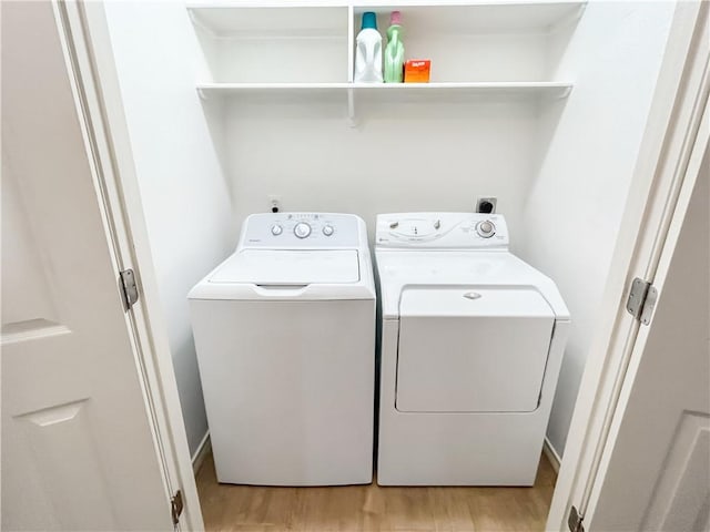 2418 Mystic Star Dr, Corpus Christi, TX 78414 - laundry room featuring washer and dryer and light wood finished floors
