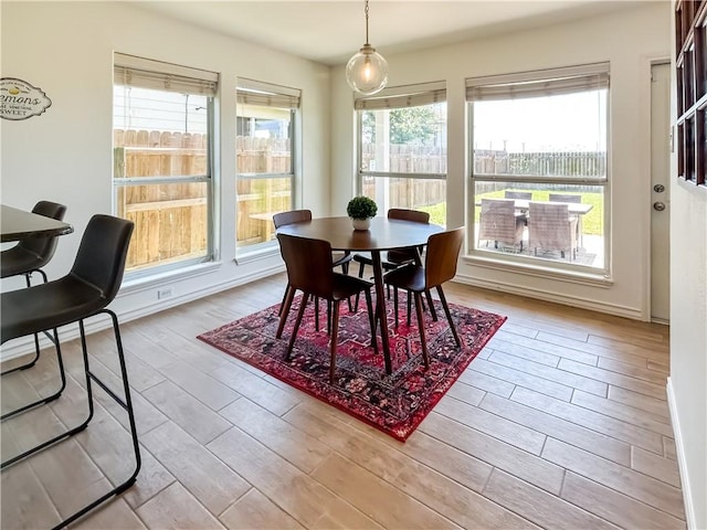 2418 Mystic Star Dr, Corpus Christi, TX 78414 - dining space with plenty of natural light, wood finished floors, and baseboards