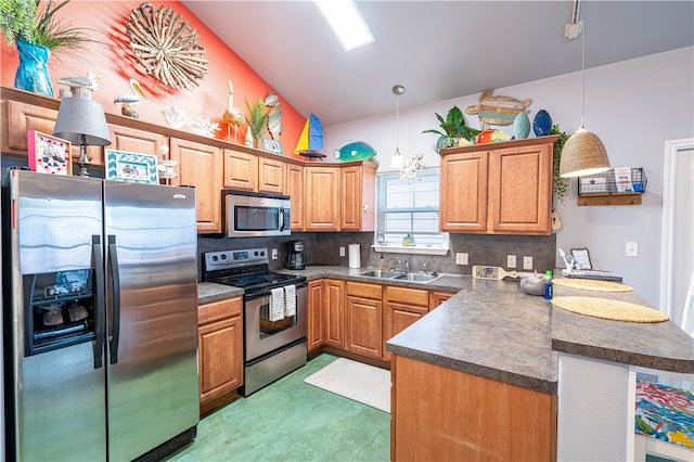 kitchen with decorative backsplash, stainless steel appliances, kitchen peninsula, and decorative light fixtures