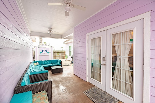 view of patio with an outdoor living space, a storage unit, and ceiling fan