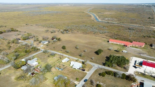 birds eye view of property featuring a rural view