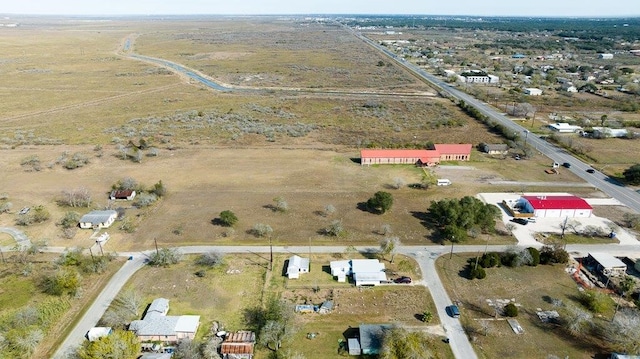 birds eye view of property featuring a rural view