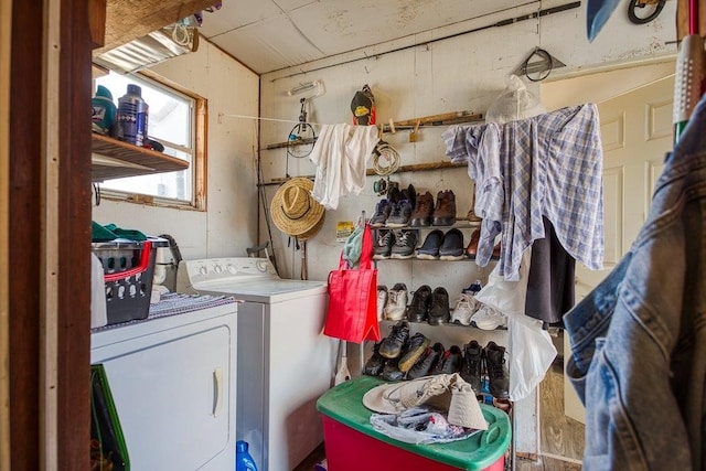 laundry room featuring washing machine and clothes dryer