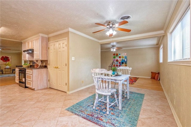 dining space featuring visible vents, baseboards, ceiling fan, and light tile patterned floors