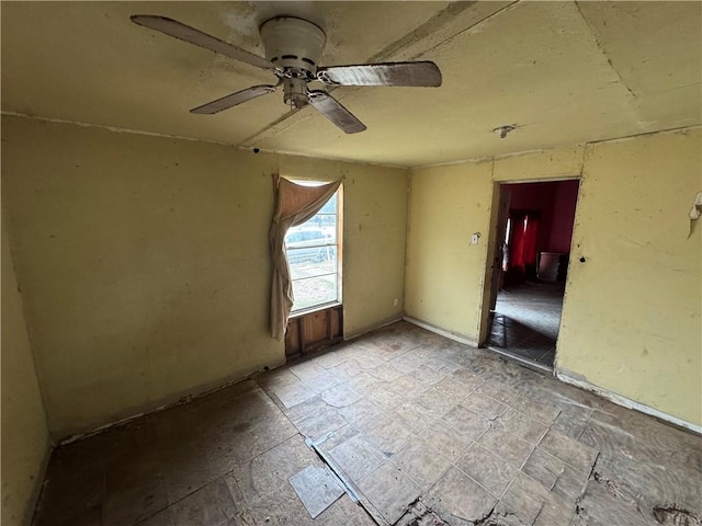 empty room featuring ceiling fan