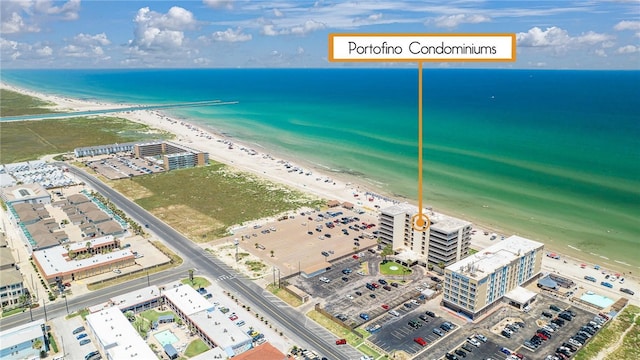 aerial view featuring a beach view and a water view