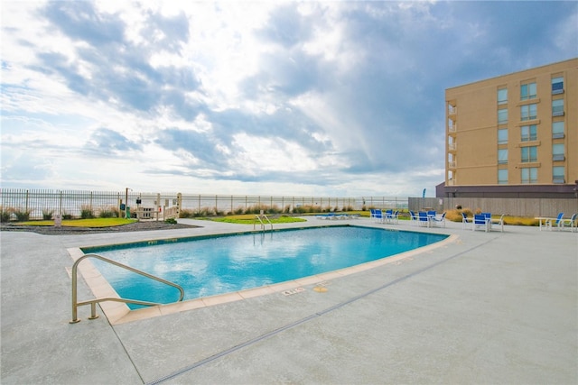 view of pool with a patio