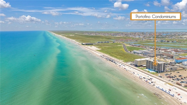 aerial view featuring a water view and a view of the beach