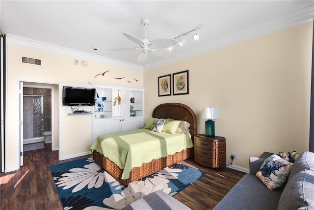 bedroom featuring dark hardwood / wood-style flooring, ensuite bathroom, ceiling fan, and ornamental molding