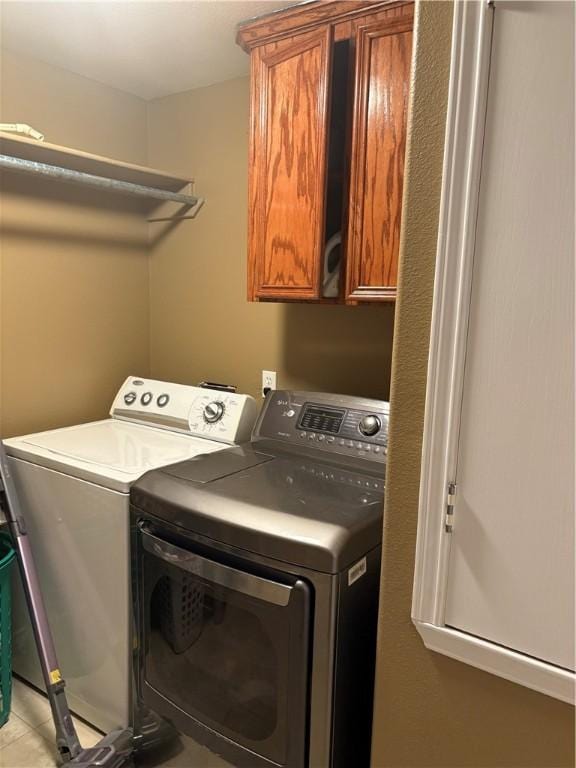 915 Flour Bluff Dr, Corpus Christi, TX 78418 - washroom with washer and dryer and cabinet space