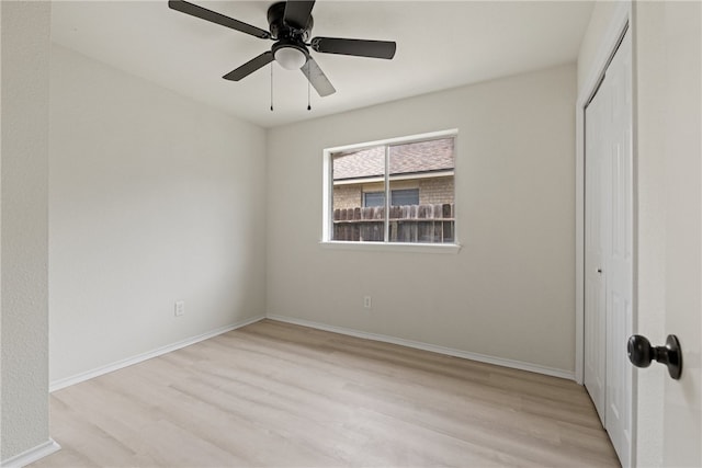 7926 Falcon Dr, Corpus Christi, TX 78414 - unfurnished bedroom featuring a closet, wood finished floors, and a ceiling fan