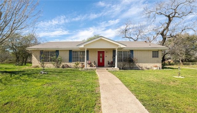 ranch-style house featuring a front lawn