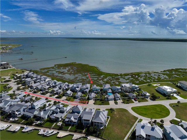 126 Reserve Ln, Rockport, TX 78382 - aerial overview of property's location with a nearby body of water and nearby suburban area
