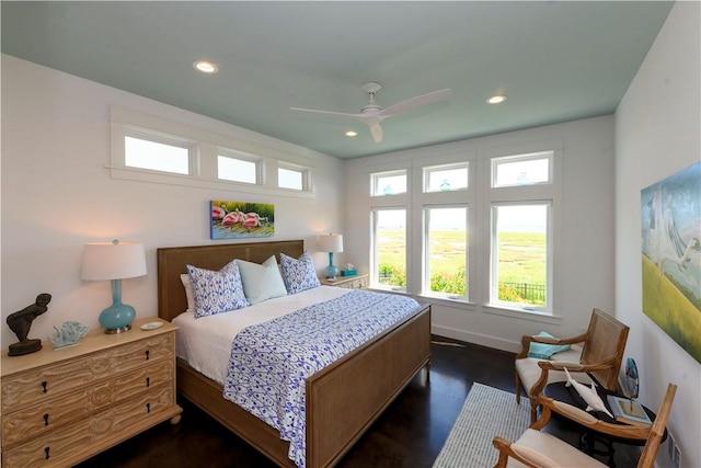 126 Reserve Ln, Rockport, TX 78382 - bedroom featuring recessed lighting, multiple windows, dark wood-type flooring, ceiling fan, and baseboards