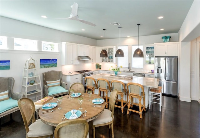 126 Reserve Ln, Rockport, TX 78382 - dining room featuring recessed lighting, ceiling fan, and dark wood finished floors