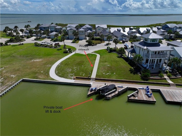 126 Reserve Ln, Rockport, TX 78382 - aerial view of residential area featuring a large body of water