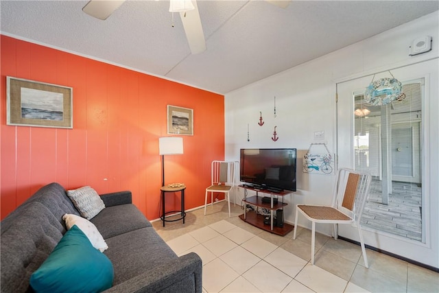 14300 S Padre Island Dr Unit 125, Corpus Christi, TX 78418 - tiled living room featuring ceiling fan and baseboards