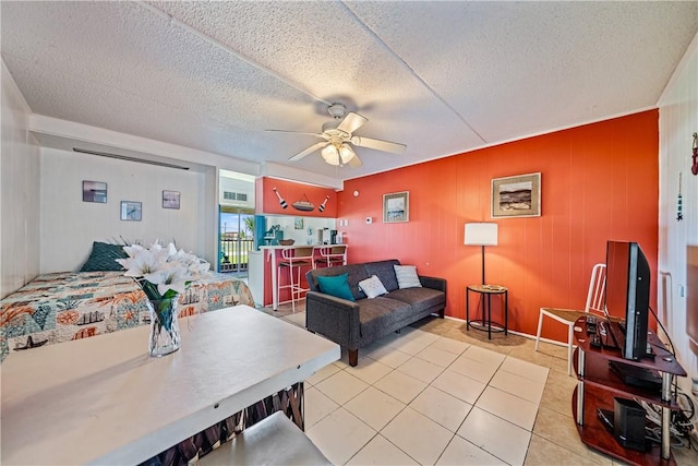 14300 S Padre Island Dr Unit 125, Corpus Christi, TX 78418 - living area featuring a ceiling fan, light tile patterned flooring, and a textured ceiling