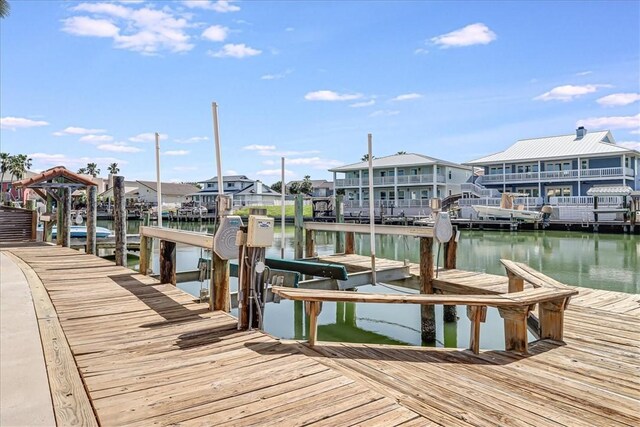 314 Bahia Mar Prt, Aransas, TX 78373 - dock area with a residential view, boat lift, and a water view