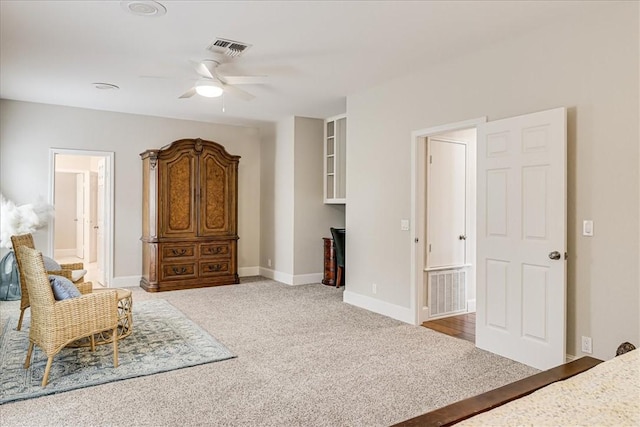314 Bahia Mar Prt, Aransas, TX 78373 - interior space with light carpet, baseboards, visible vents, and ceiling fan