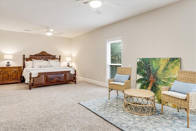 314 Bahia Mar Prt, Aransas, TX 78373 - bedroom featuring ceiling fan, baseboards, and light colored carpet