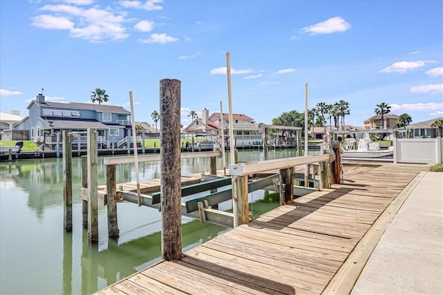 314 Bahia Mar Prt, Aransas, TX 78373 - dock area featuring a residential view, boat lift, and a water view