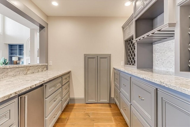 314 Bahia Mar Prt, Aransas, TX 78373 - bathroom featuring tasteful backsplash, vanity, wood finished floors, and recessed lighting