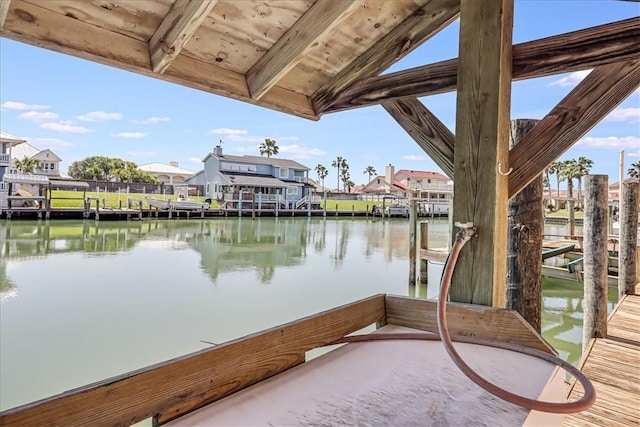 314 Bahia Mar Prt, Aransas, TX 78373 - view of dock with a residential view and a water view