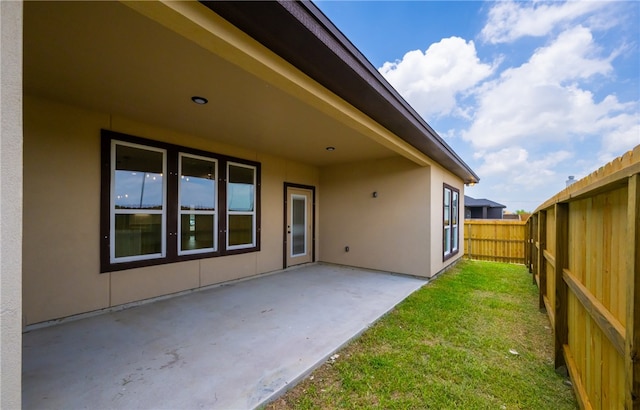 6202 Olivia St, Corpus Christi, TX 78415 - fenced backyard with a patio area