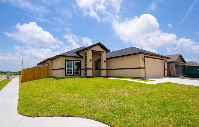 6202 Olivia St, Corpus Christi, TX 78415 - view of front of house with driveway, a garage, a shingled roof, and stucco siding