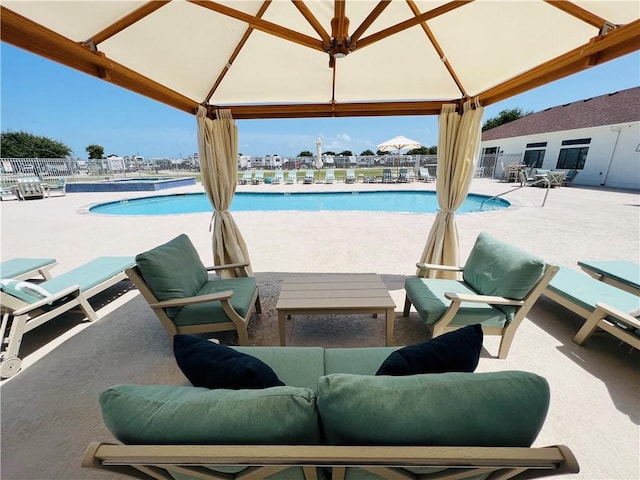 104 Augusta Cir, Aransas Pass, TX 78336 - view of patio / terrace featuring a gazebo and a community pool
